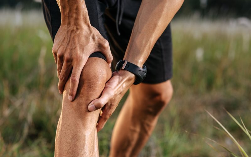 man-bent-her-head-grabbed-him-her-after-exercise