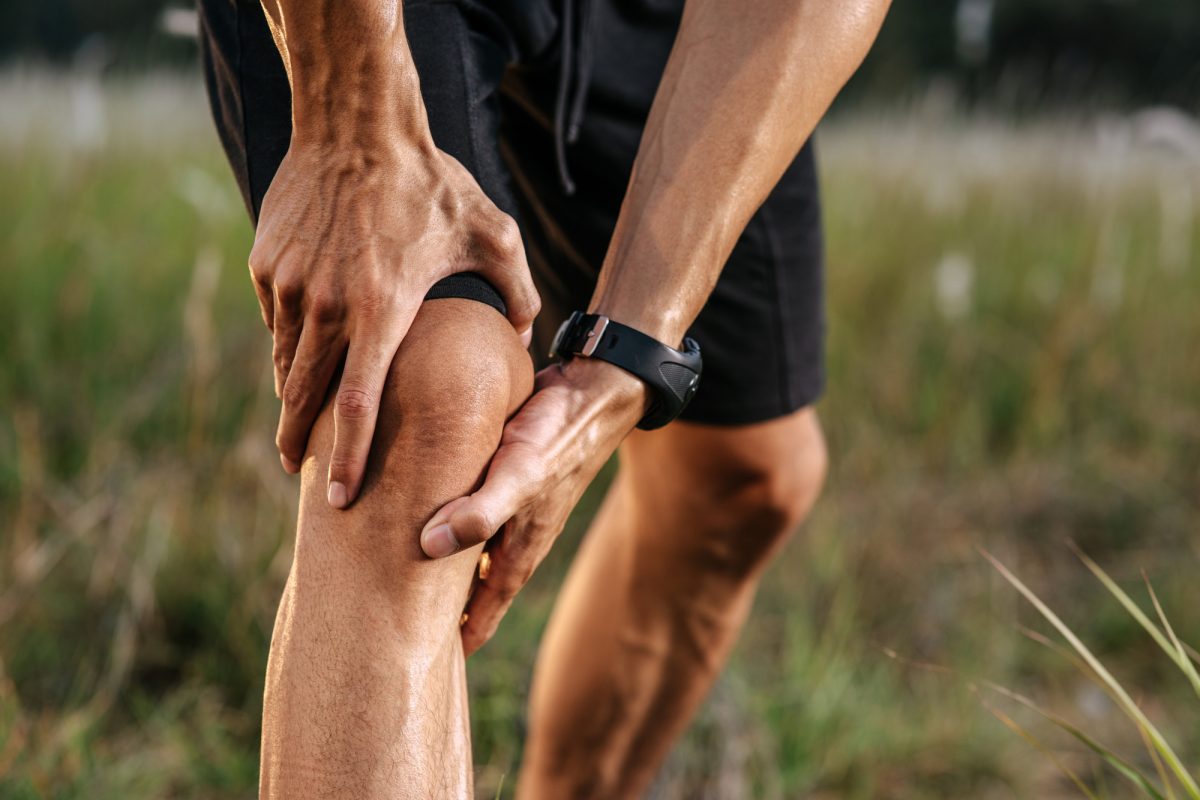 man-bent-her-head-grabbed-him-her-after-exercise